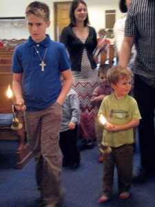 Shane & Micah lighting the candles